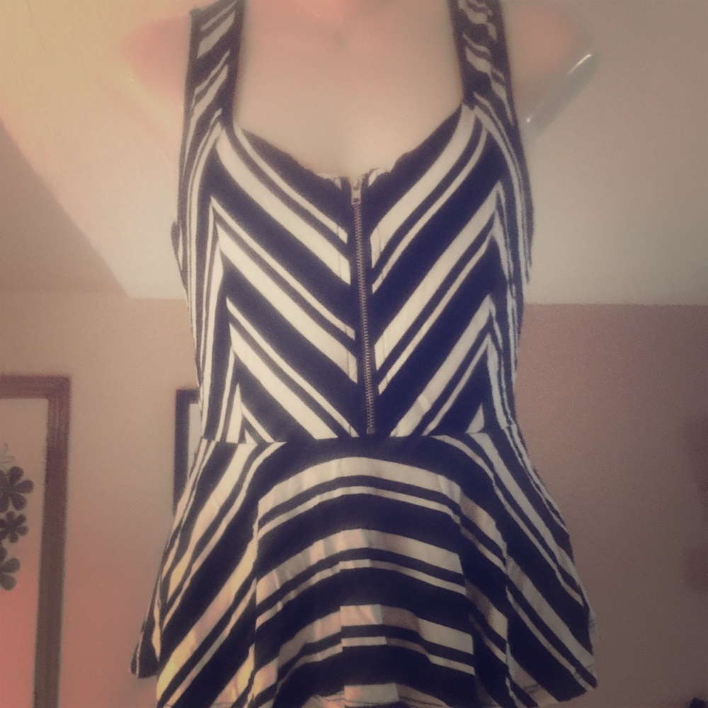 Optical illusion stripped zip up peplum top