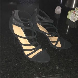 Black heels, never worn