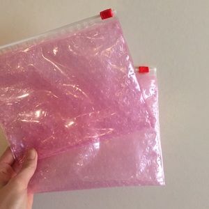 Pink Glossier pouches