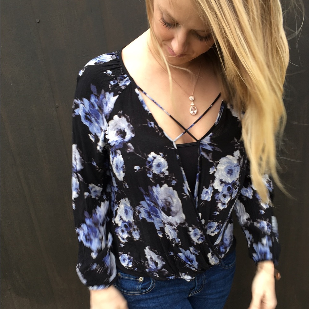 Black and blue floral criss-cross neckline top