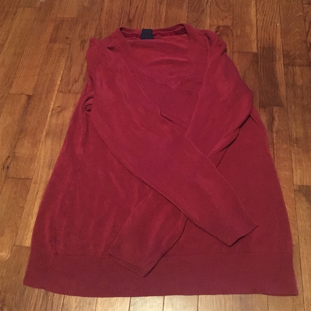 Red V-neck sweater