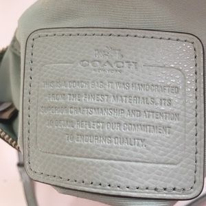 Coach mint green cross body.