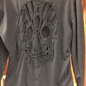 Black long sleeve top with skull cutout