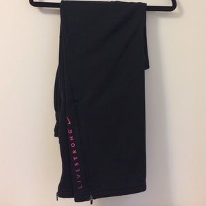 Black livestrong sweatpants.