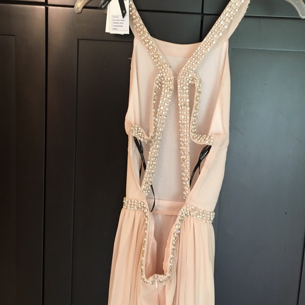 Brand new, never worn prom dress