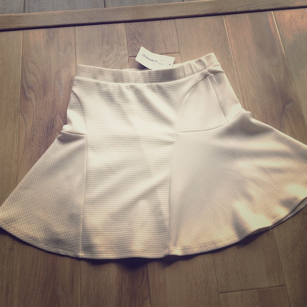 Cream mini skirt new with tags