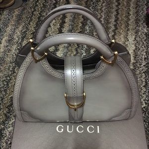 New Gucci stirrup in grey. Never worn