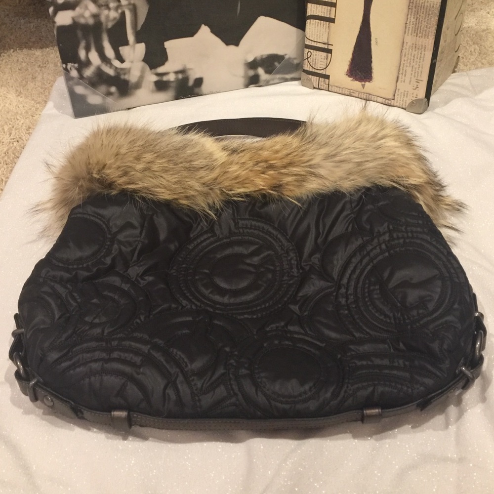 Mint condition fur collar coach bag. Barely used.