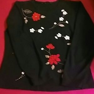 Sweater with embroidered design