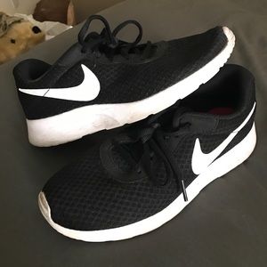 Black Nike running shoes