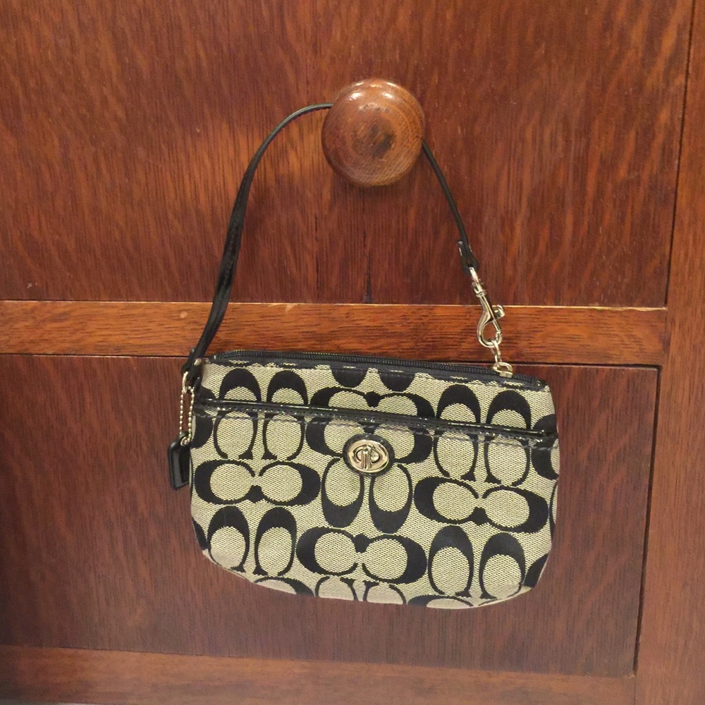 Brand new Coach wristlet bag.