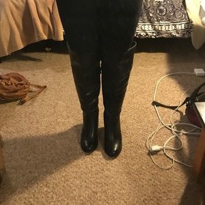 Never worn black leather thigh high healed boots!