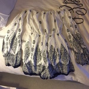 Off the shoulder white and blue patterned romper