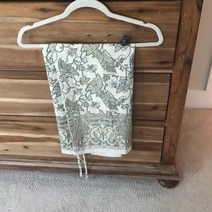 Long wrap silk skirt in tropical print.