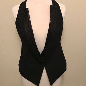 Black Tuxedo style vest with a sheet back