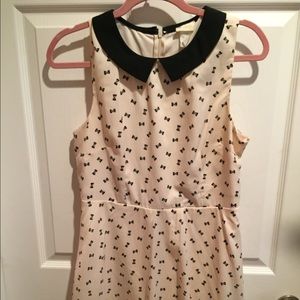 Cream/tan dress black Peter Pan collar bow design