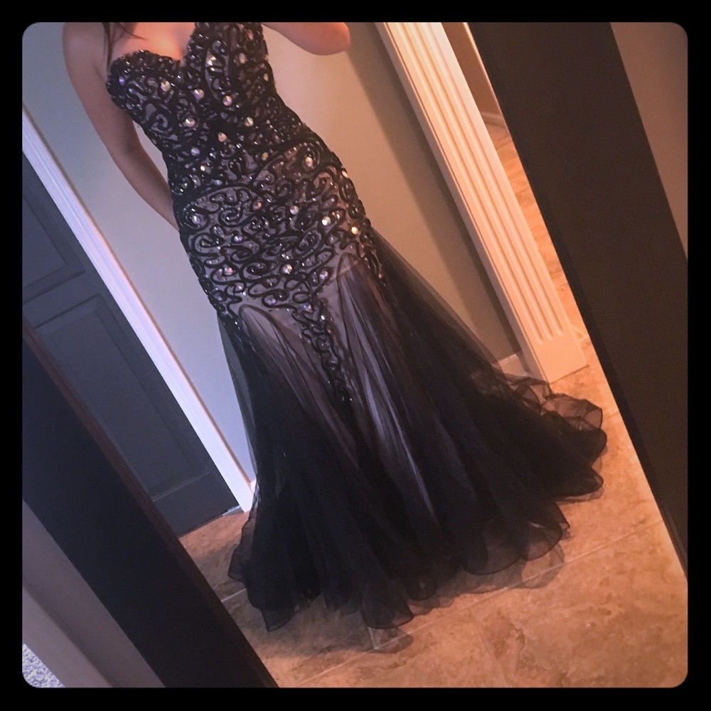 Jovani gown never worn. Perfect condition.