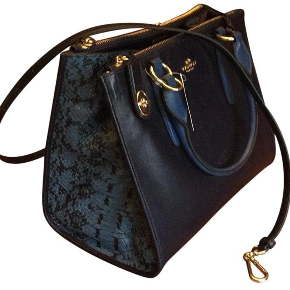 2 month old Navy blue w Aligator Coach bag