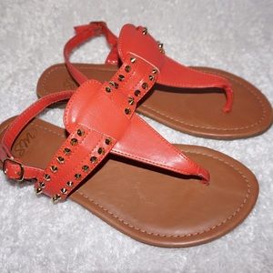 Orange sandals with Stud details