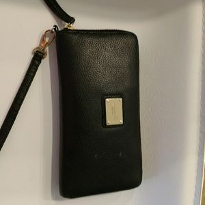 Free Kenneth Cole wristlet purse with next bundle.