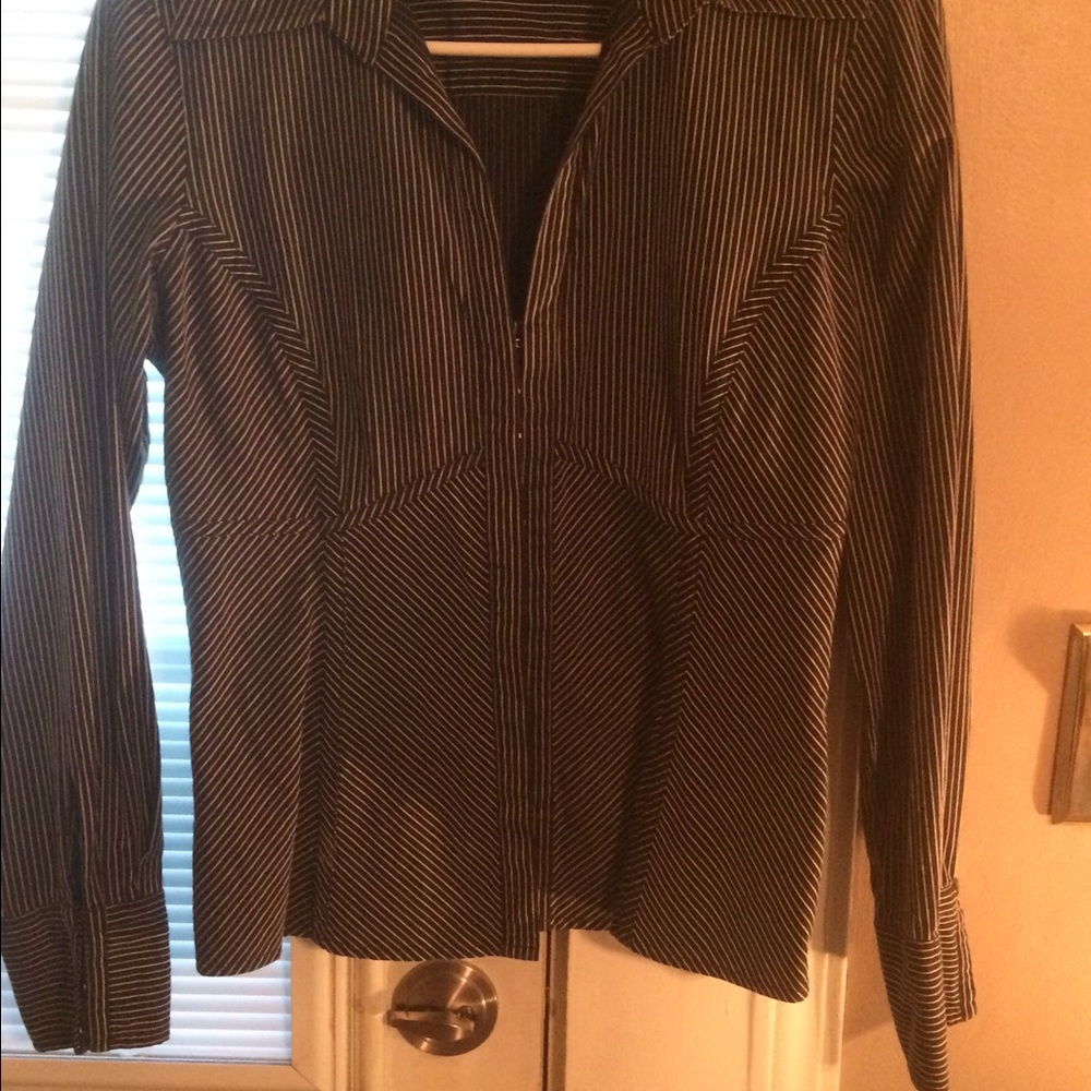 The limited black striped blouse
