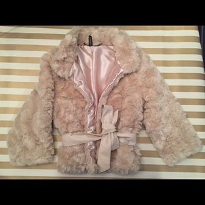 3/4 length sleeve faux fur coat.
