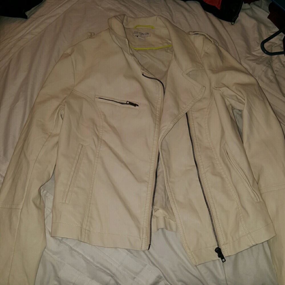 Ivory cotton on leather jacket