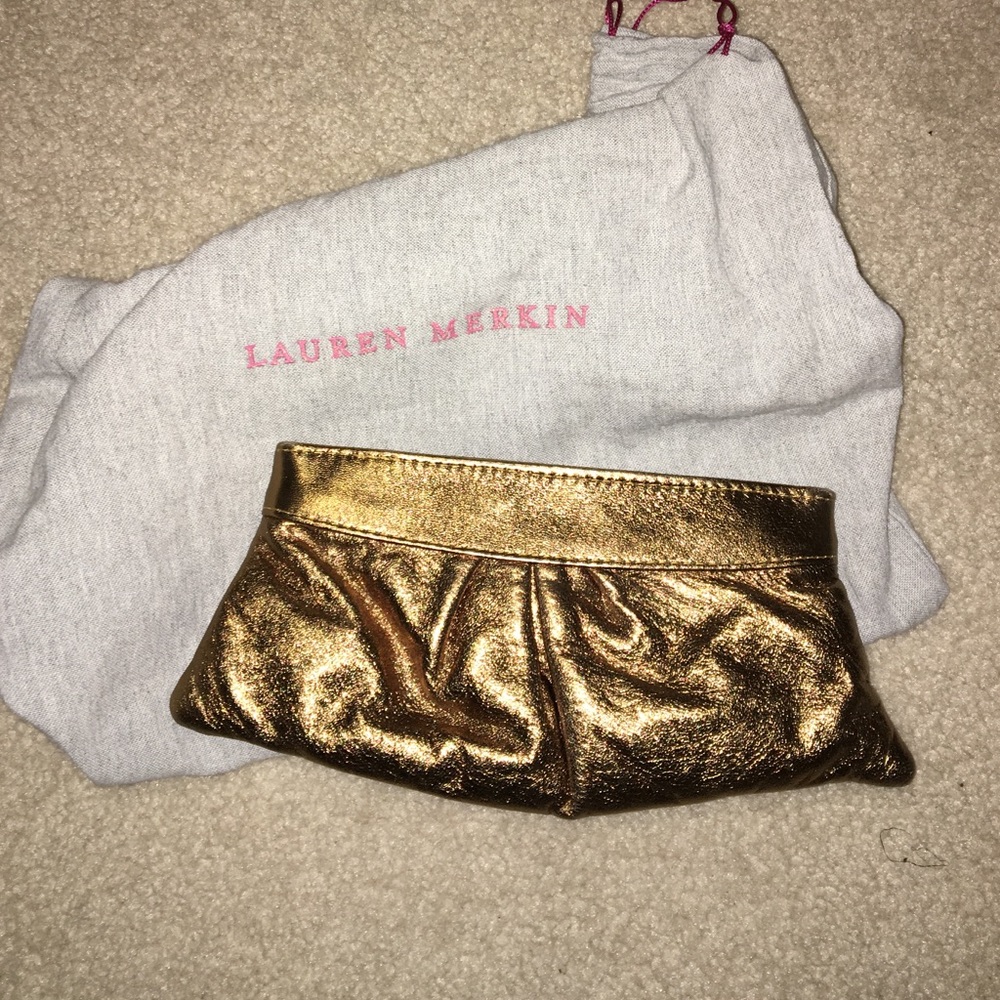 Authentic Lauren Merkin bronze clutch.