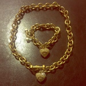 Juicy couture necklace and bracelet set.