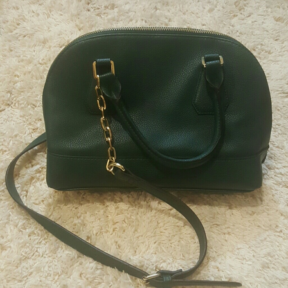 Green purse and black wallet