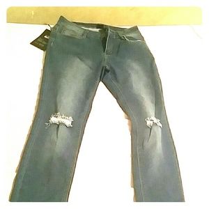 Skinny Jeans with a ripped knee