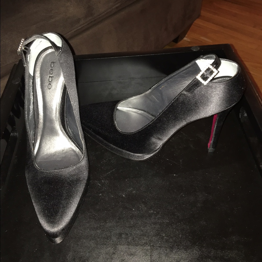 Black satin new Bebe pumps