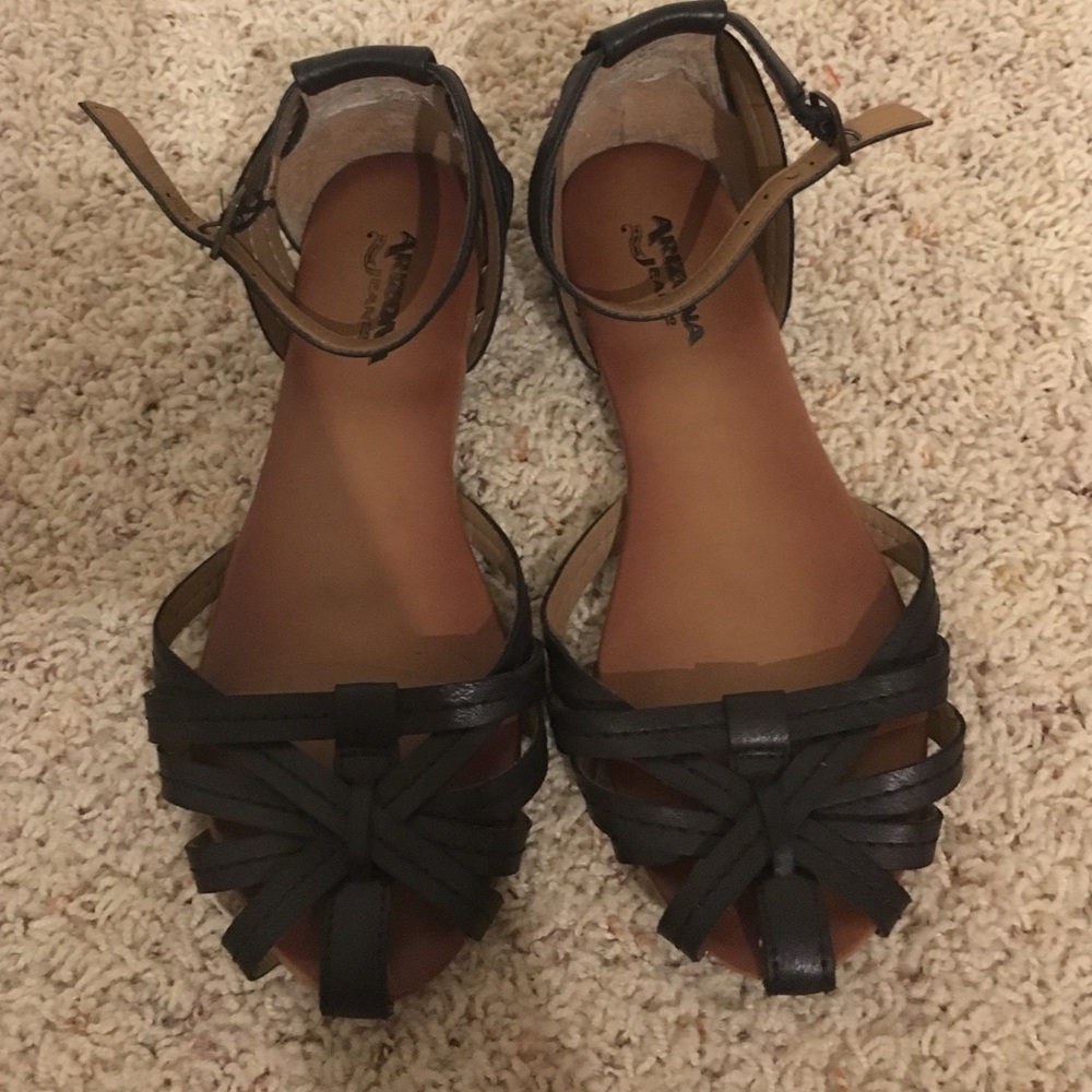 Black woven closed toed sandals