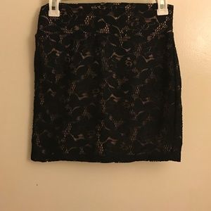 Black and cream lace mini skirt