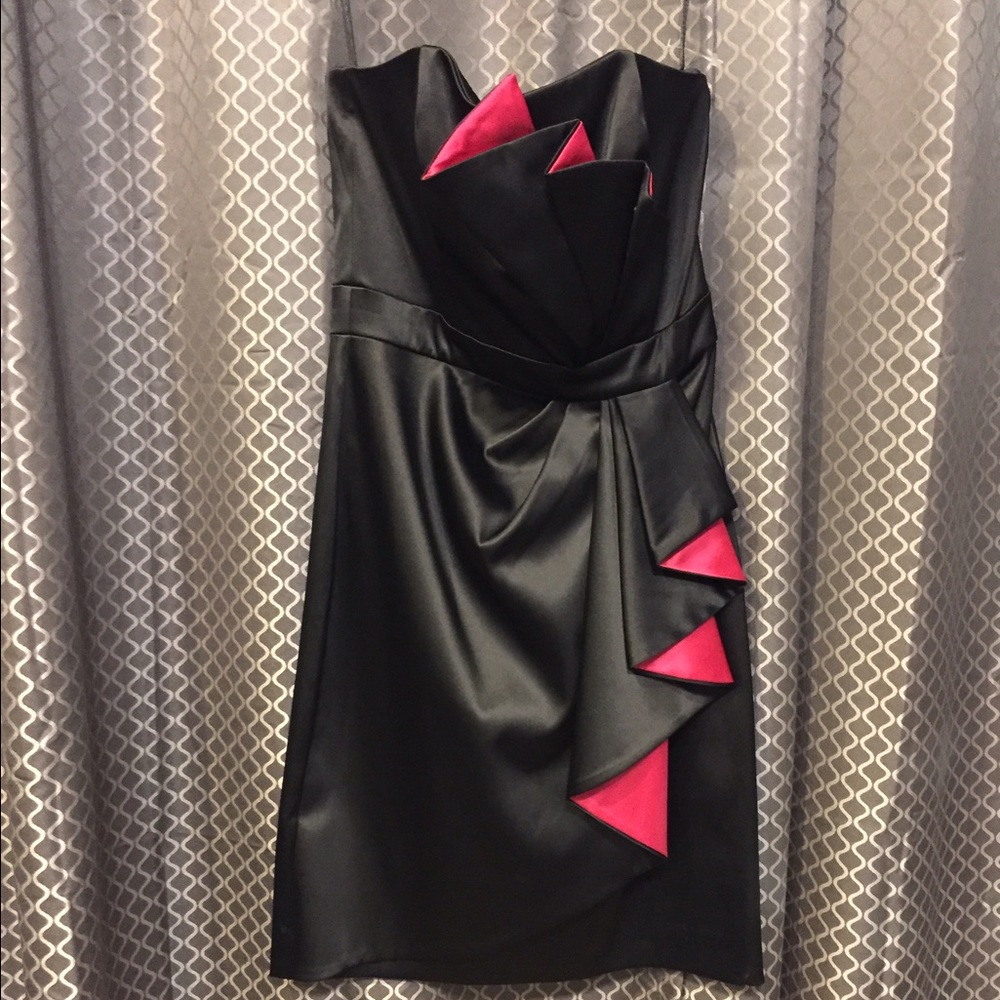 Black cocktail dress with hot pink detail