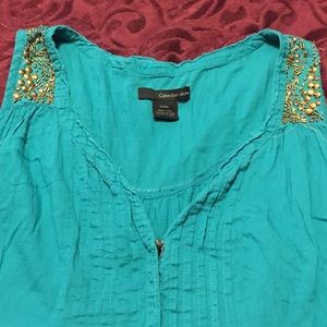 Teal Calvin Klein tank top.
