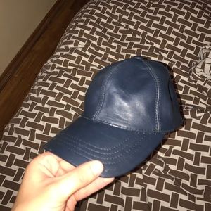 Blue /Black leather hat, not sure if real leather