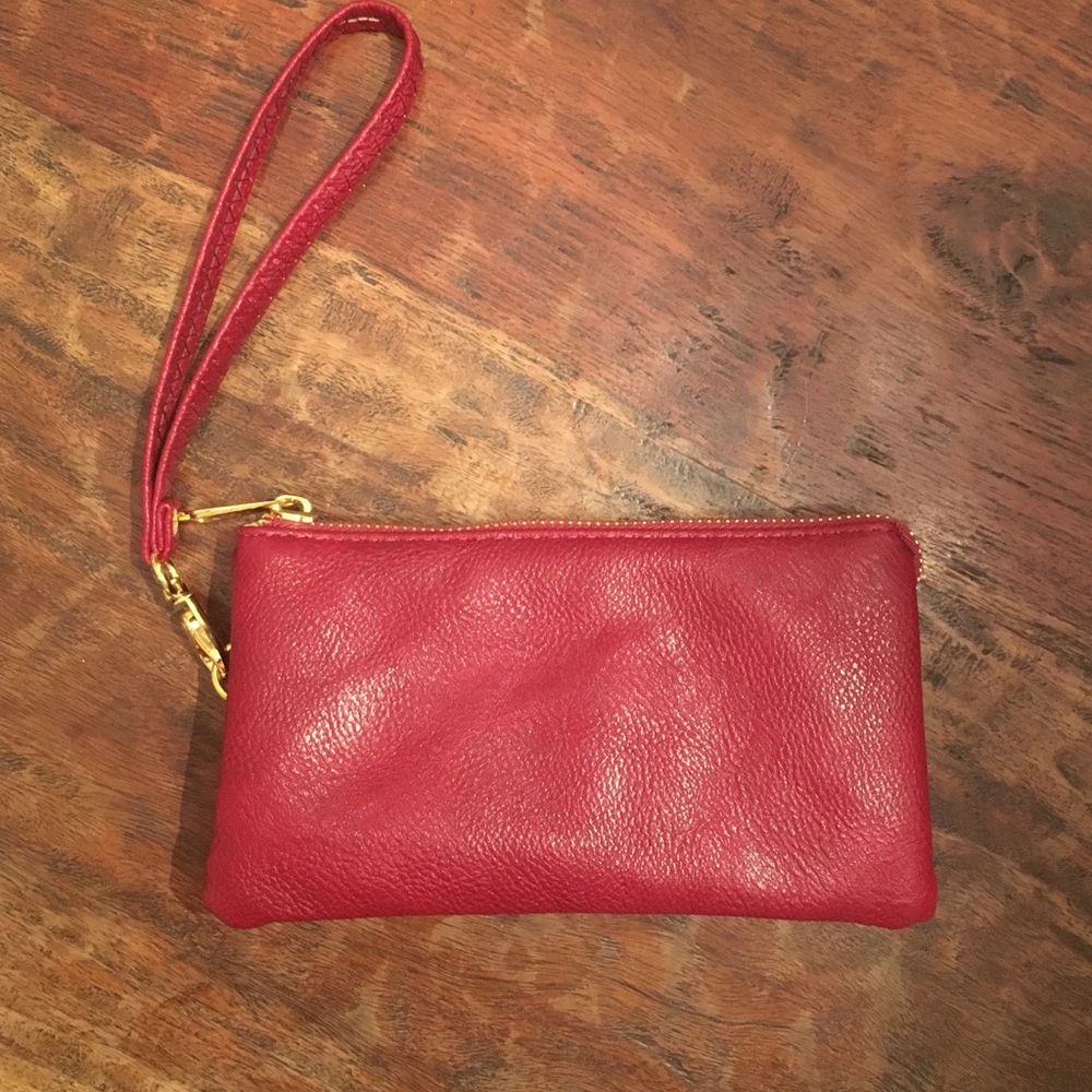 never been used, burgundy wristlet