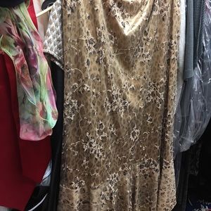 Two piece animal print dressy outfit.