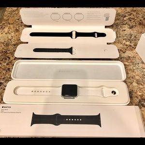 Apple Watch Sport, 38mm case w/ white sport band.