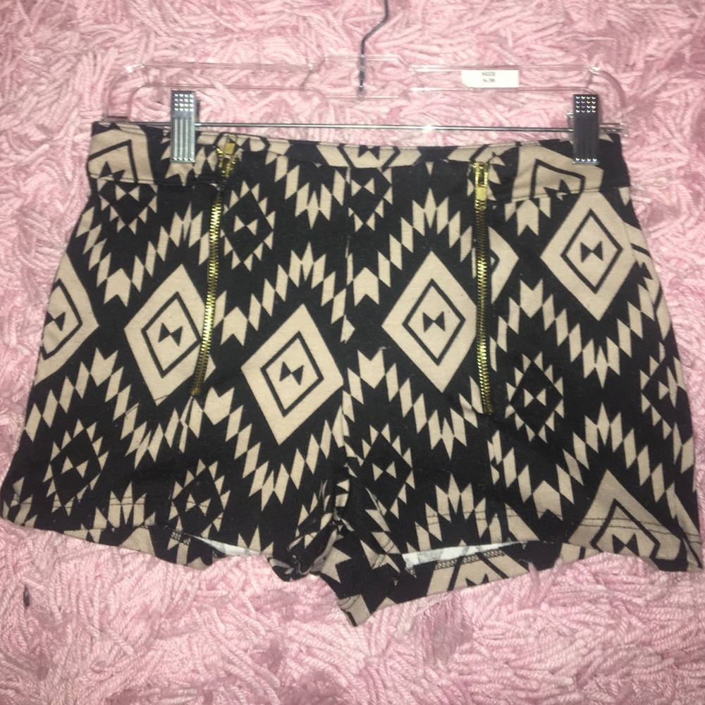 tan and black shorts