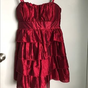 Red tiered satin finish dress.