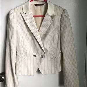 White pinstriped blazer.