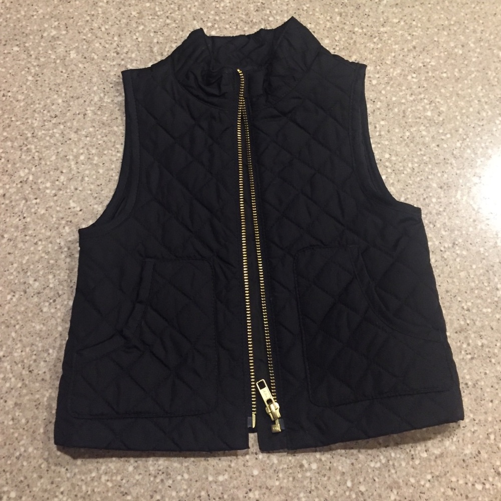 Adorable girls black quilted vest!