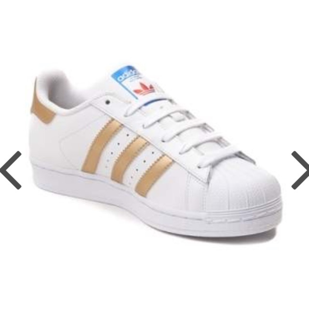 White and gold adidas superstars US women's 7