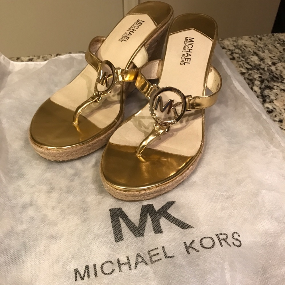 Michael Kors gold wedges
