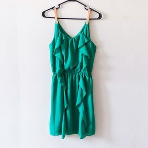 Green dress with gold straps