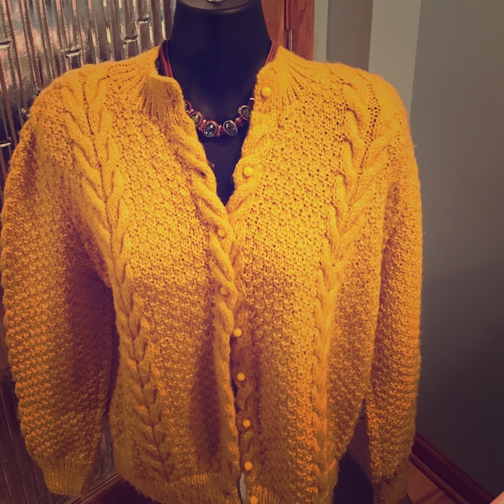 Mustard wool sweater with pearl like buttons