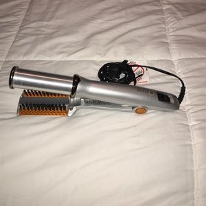 Instyler rotating curling iron. In Styler.