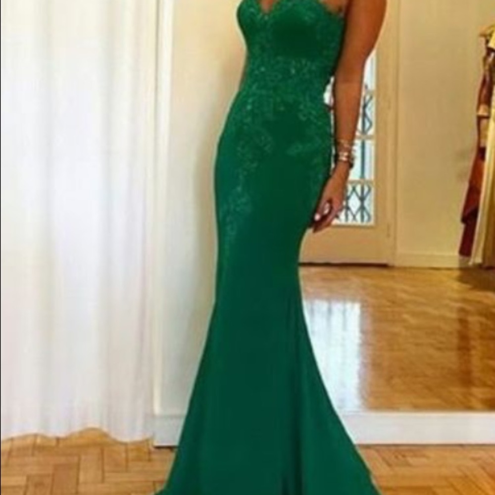 Green embroidered gown